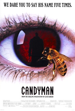 Candyman (1992) poster: a close-up of an eye with a red pupil, a dark silhouette inside it, a bee on the lashes, and the title below