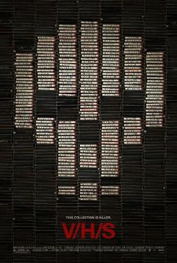 V/H/S (2012) poster: a skull made of VHS tapes on a wall of tapes, with the red title below